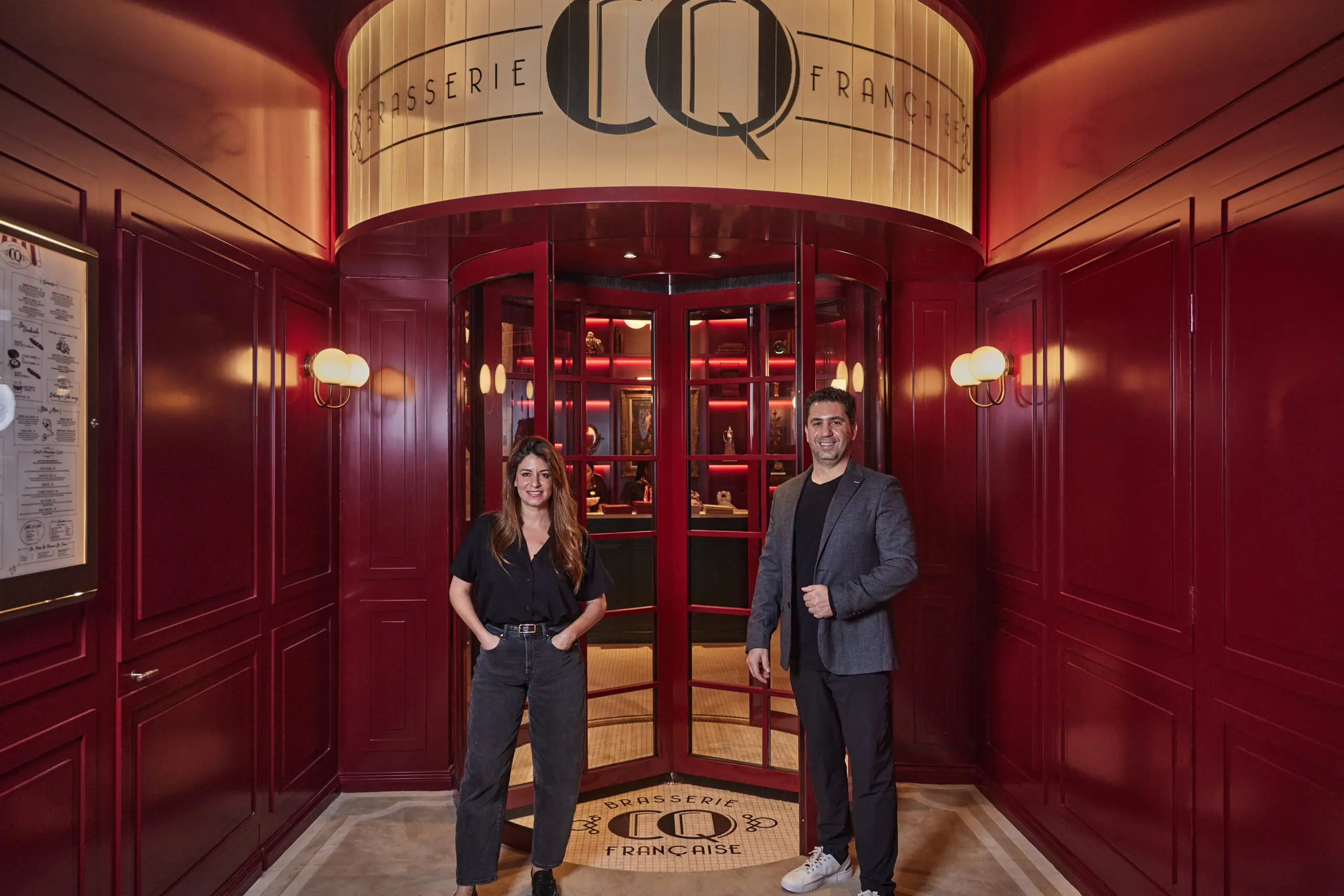 Ziad and Rowan Kamel seated at a table.